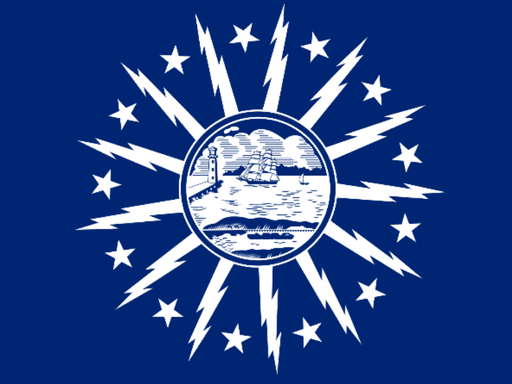 BLUE DECAL WITH A SHORE AND LIGHTHOUSE IN THE CENTER WITH LIGHTNING BOLTS AROUND THE CENTER
