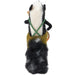 Felted skunk playing a banjo figurine that stands on a table