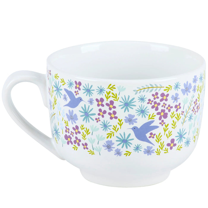 Mug with floral design and 'a cup of comfort' text on the inside rim