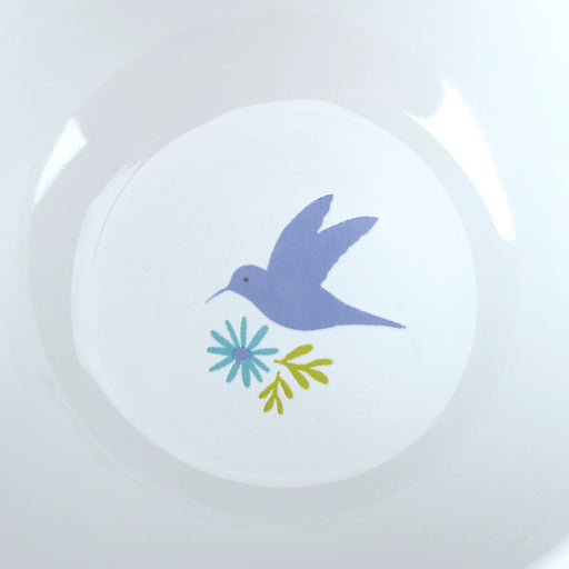 Mug with floral design and 'a cup of comfort' text on the inside rim