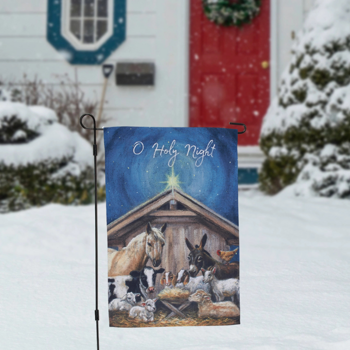 Decorative garden flag with a nativity scene featuring animals and 'O Holy Night' text.