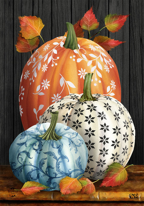 Decorative flag with pumpkins and leaves on a wooden look background