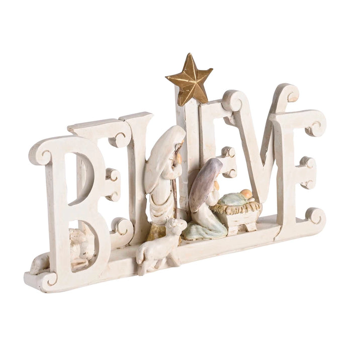 Decorative nativity scene with 'BELIEVE' letters on a white background