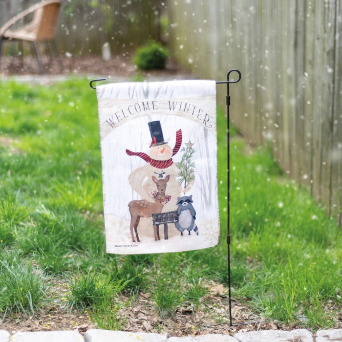 Decorative garden flag with winter-themed design featuring a snowman, deer, and raccoon with 'Welcome Winter' text.
