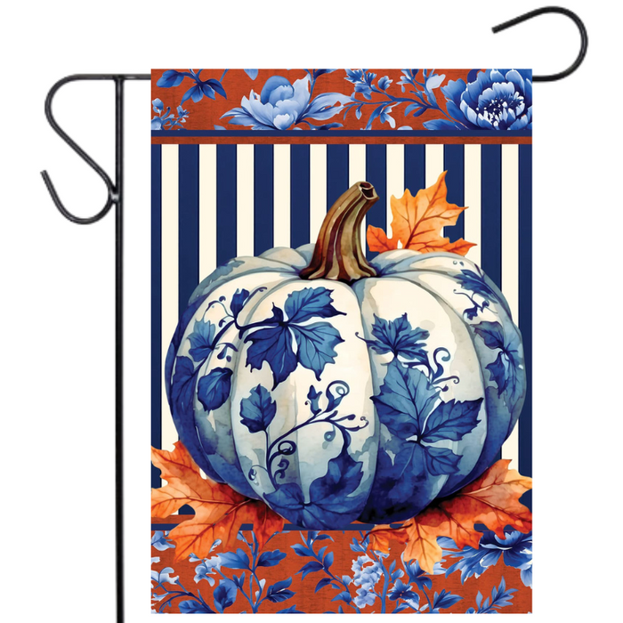 Decorative flag with a blue and white pumpkin design on a striped background.
