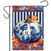 Decorative flag with a blue and white pumpkin design on a striped background.