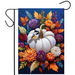 Decorative garden flag with a pumpkin, bird, and colorful flowers on a blue background.
