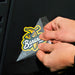 Person applying a 4x4" Savannah Bananas logo decal to a surface