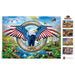 Eagle with American flag puzzle in a natural setting with animals and mountains.