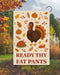 Decorative garden flag with a turkey and fall-themed elements on a beige background.