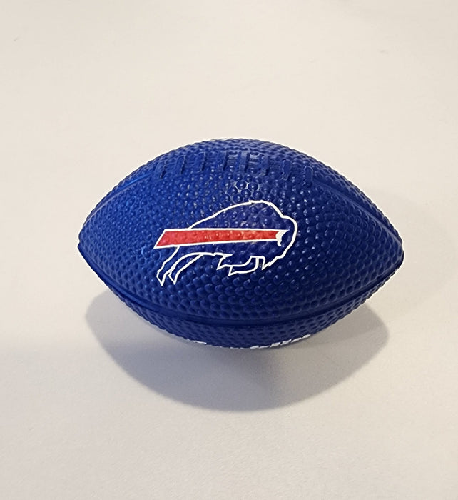 A small blue textured football-shaped object with the Buffalo Bills charging buffalo logo in white and red, placed on a light gray surface.