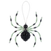Decorative spider with black and green beads on a white background