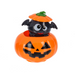 Halloween-themed toy with a black bat in an orange pumpkin on a white background