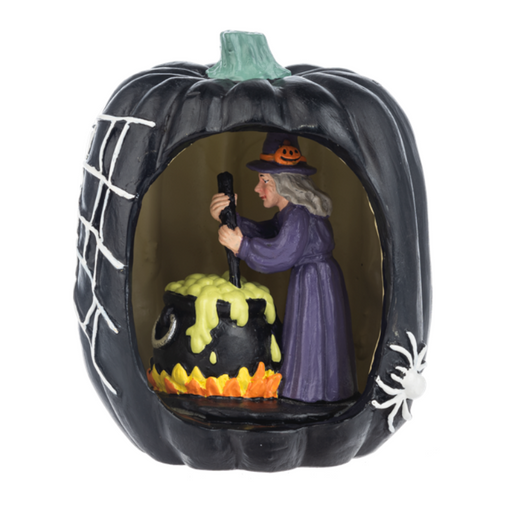 Halloween-themed figurine with a witch inside a pumpkin, brewing her cauldron