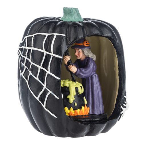 Halloween-themed figurine with a witch inside a pumpkin, brewing her cauldron