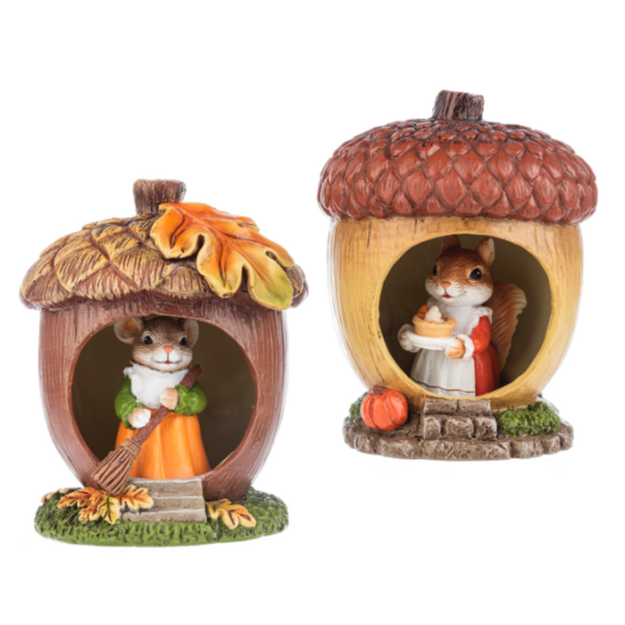 Two decorative acorn-shaped houses with small animal figurines on a white background