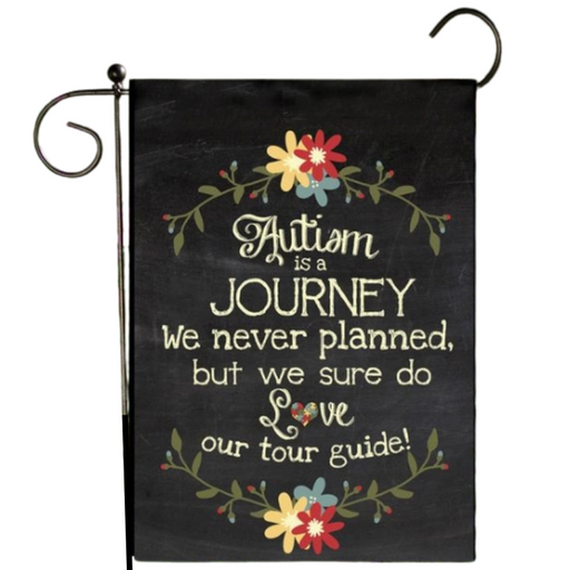 Decorative garden flag with floral design and text on a black background