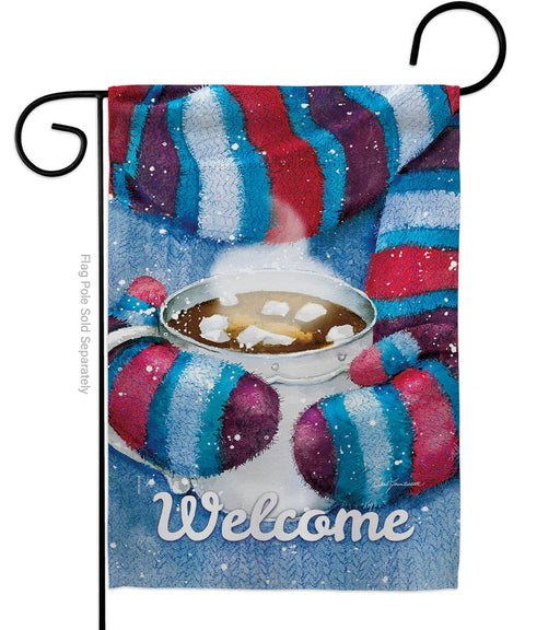 Decorative flag with a cup of hot chocolate, marshmallows, and colorful striped scarf and mittens with the word 'Welcome'.