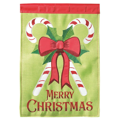 Christmas-themed garden flag with candy canes, bow, and 'Merry Christmas' text on a green background.