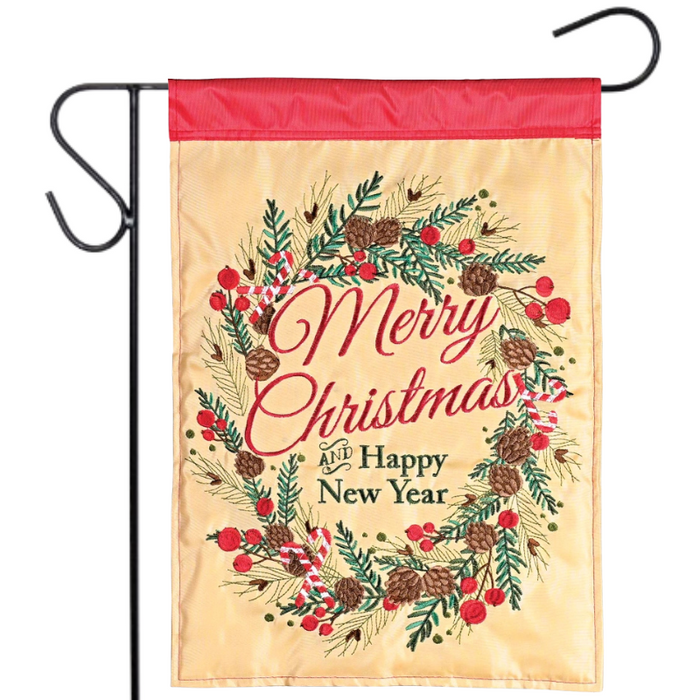 Christmas garden flag with wreath design and text on a beige background