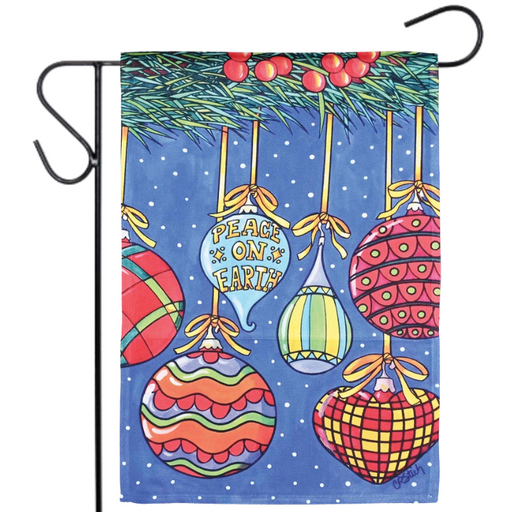 Decorative garden flag with colorful Christmas ornaments and 'Peace on Earth' text on a blue background.