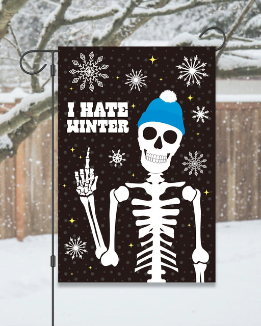 Skeleton wearing a blue beanie with 'I Hate Winter' text on a decorative flag.