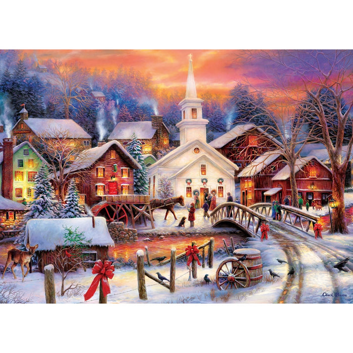 Winter village scene with a church, houses, and people gathered around a bridge.