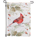 Garden flag with a red cardinal bird on a branch design, featuring winter elements like pinecones and berries.