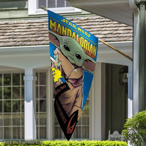 star wars themed flag with grogu in the center on a flagpole
