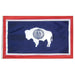 red white and blue flag with a white buffalo silhouette and the state seal in the center