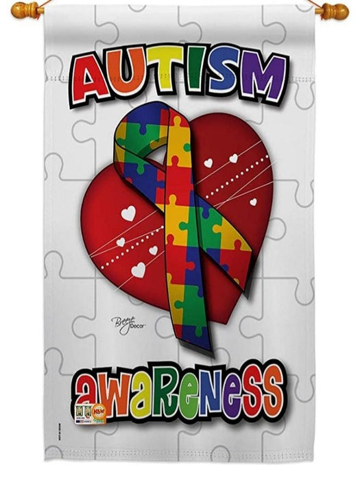 white flag with puzzle piece design with awareness ribbon in the center