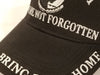 black hat with white embroidered letters "you are not forgotten" pow mia insignia