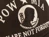 black hat with white embroidered letters "you are not forgotten" pow mia insignia