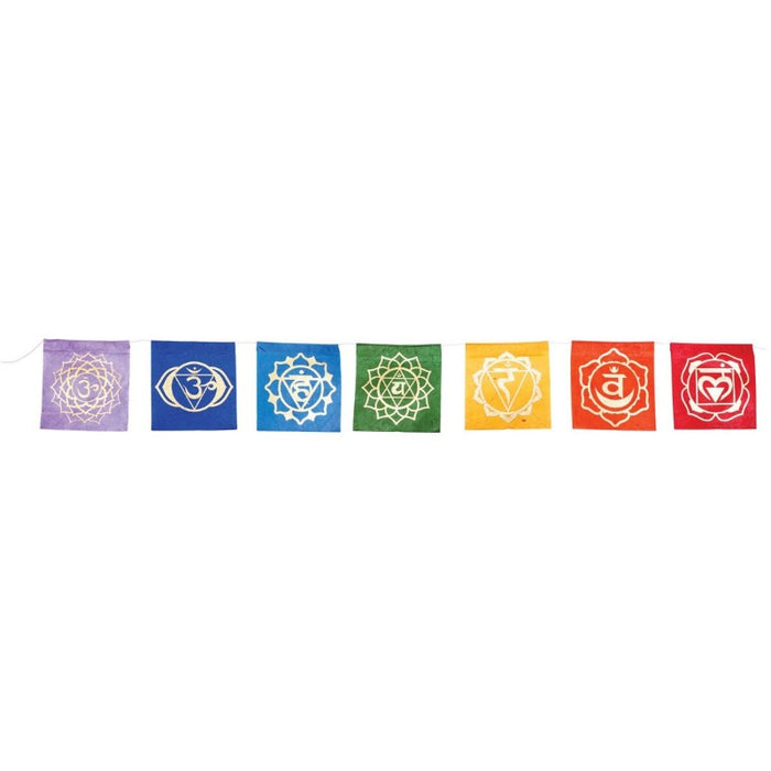 multi colored paper flags with different colored chakra symbols