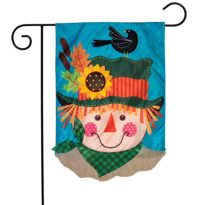 scarecrow themed flag with crow and blue background