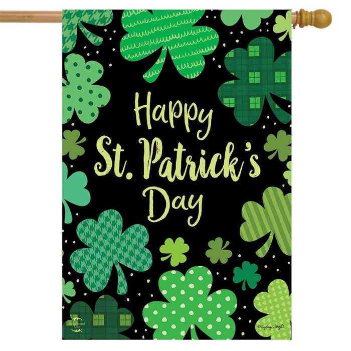 black flag with shamrock patterns and text saying "happy St. patrick's day"