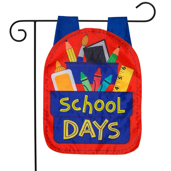 backpack shaped garden flag with text saying "school days" with school supplies 