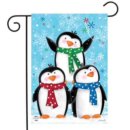 blue flag with snowflake background and 3 baby penguins on the front