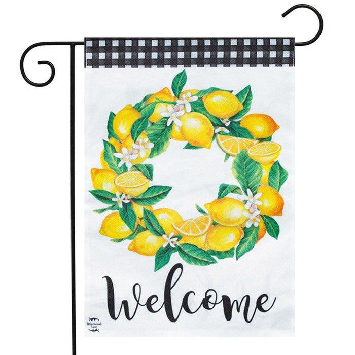 flag with wreath of lemons and the word "welcome"
