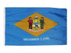 blue flag with a crest and two men with the date "December 7,1787"