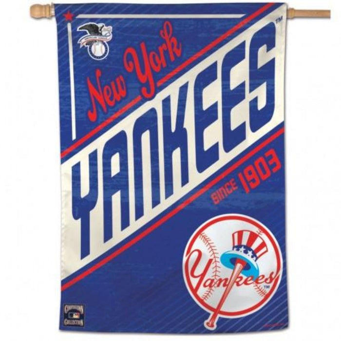 blue banner flag with text saying "new york yankees since 1903" with the yankees logo