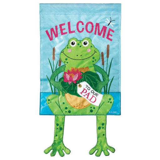 flag saying "welcome to our pad" with frog and legs coming off of the flag