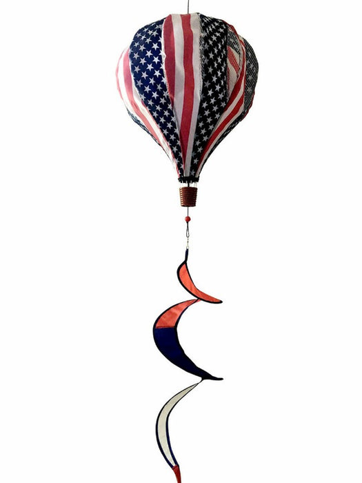 stars and stripes designs on a hot air balloon with colored tail