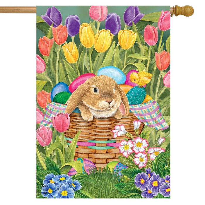 bunny and chick in a basket of easter eggs and tulip background