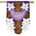purple applique flag with cross and white lilies and purple banner saying "he is risen"