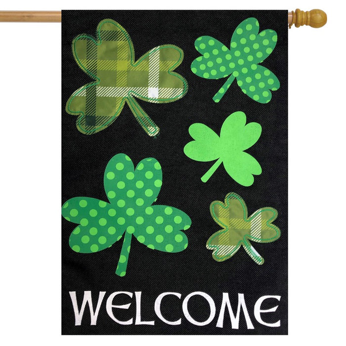 black flag with quilted shamrocks and the word "welcome" at the bottom