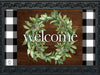 Farmhouse Wreath Doormat easily fits into the Rubber Doormat Tray (sold separately) as shown in the picture. 
