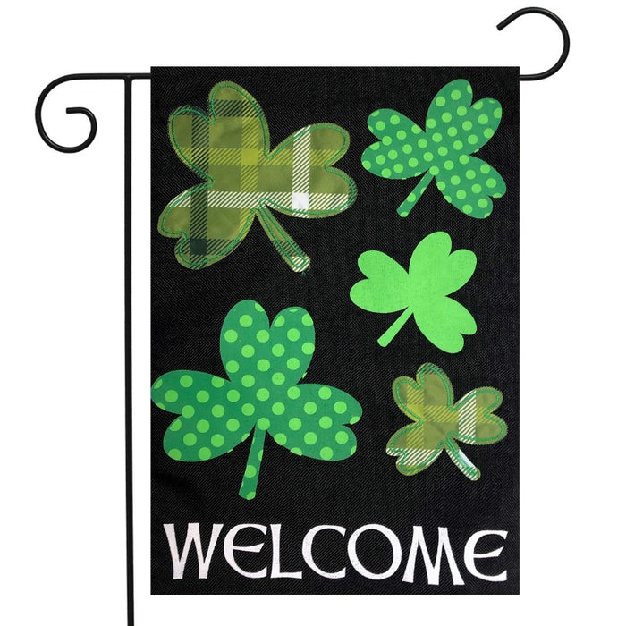 black flag with quilted shamrocks and the word "welcome" at the bottom