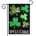 black flag with quilted shamrocks and the word "welcome" at the bottom