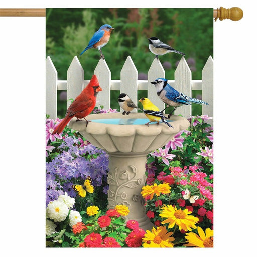 various birds around a fountain with flower background flag